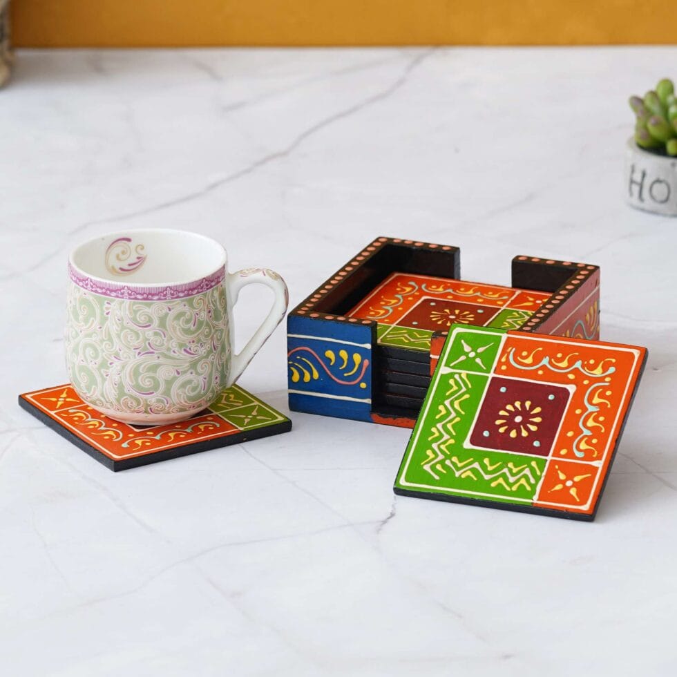 Hand-painted wooden coaster set with colorful tribal art design, perfect Diwali festive table decor